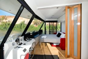 Second lounge and sofa bed area on Loud Whisper Houseboat moored at Customs House Houseboat Marina